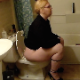 A full-figured blonde woman with glasses is recorded taking a shit while sitting on a toilet and then wiping her ass. Nice, audible pooping sounds. Over 7 minutes.